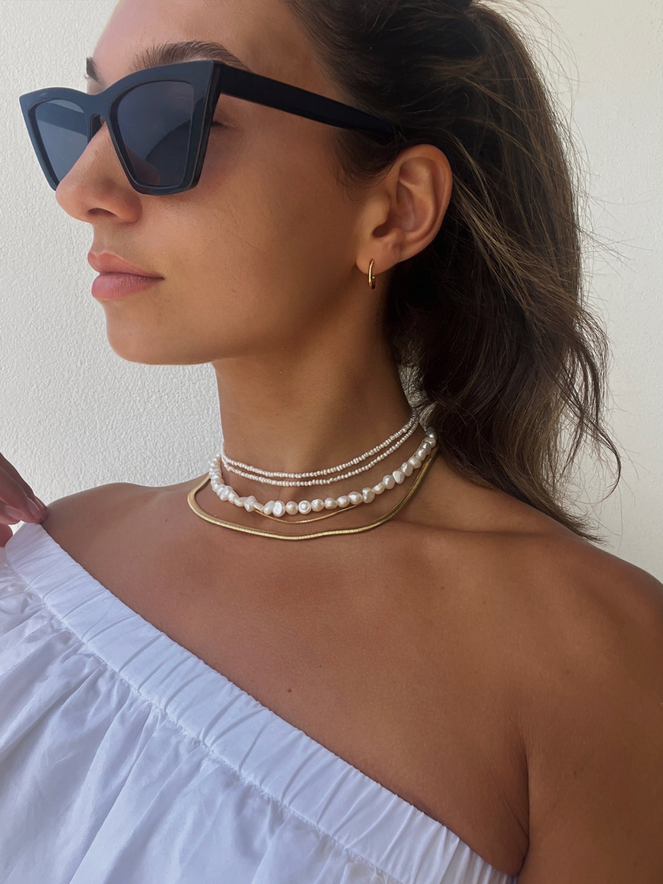 The Ultimate Pearl Necklace Stack