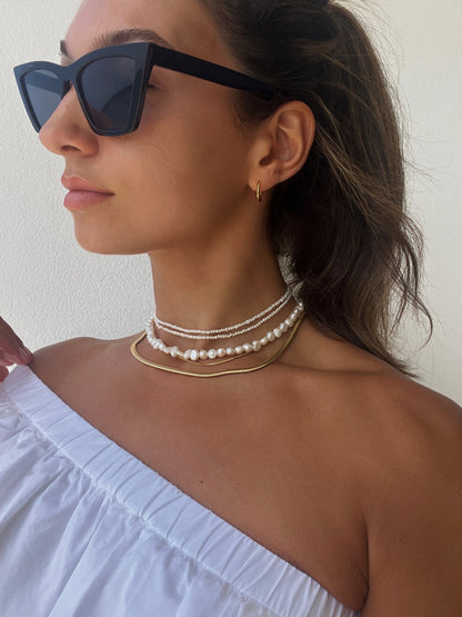 The Ultimate Pearl Necklace Stack